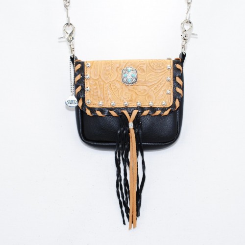 Double pocket whip stitch hip bag shown in black leather body and tan tooled design lid
