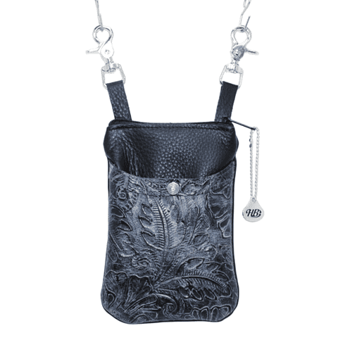 cell bag in black leather showing different leather colors of our floral leaf print