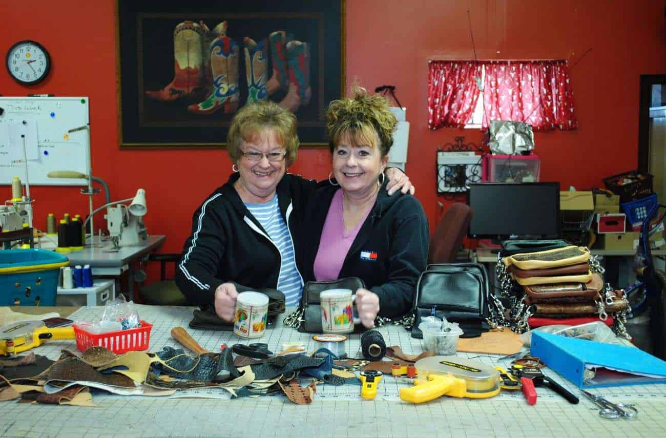 wholesale handbags designers 2 wholesale handbags designers happily sharing another productive day